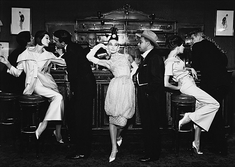 Audrey Hepburn with Simone and Barbara Mullen wearing evening dresses by Balmain, Dior, Patou, Maxim’s, Paris 1959