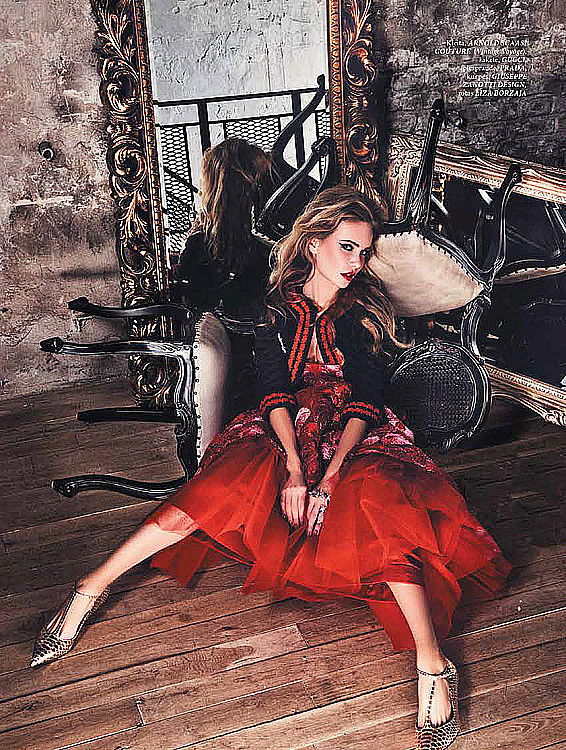 The model is wearing a couture Arnold Scaasi dress from the 1970s.