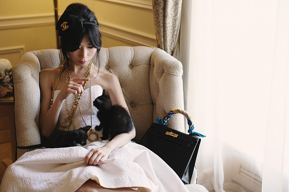 Yves Saint Laurent gown, Chanel accessories and Hermes handbag