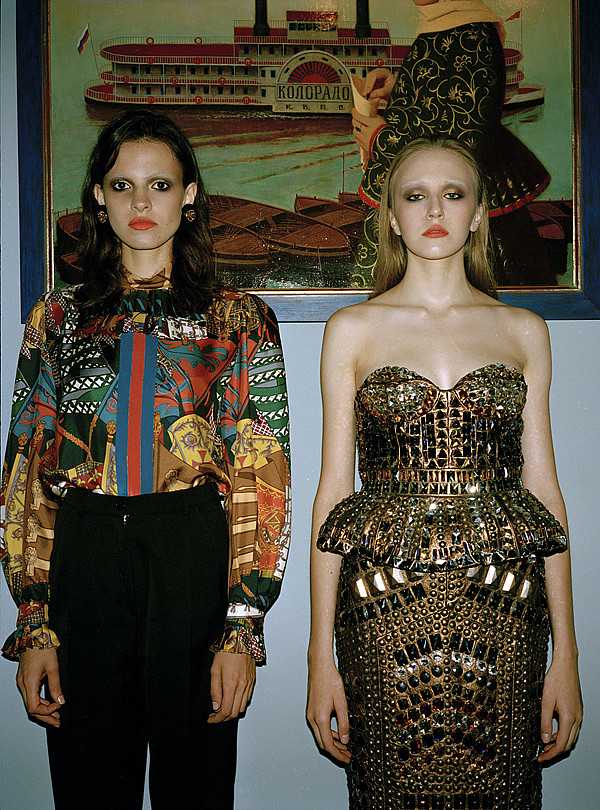 Model on the left: A ruffled Hermès silk blouse