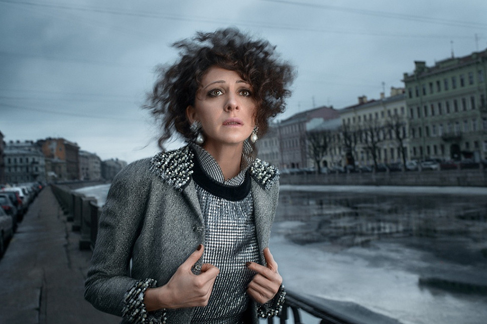 Chanel couture clip-on earrings and a Christian Dior jacket