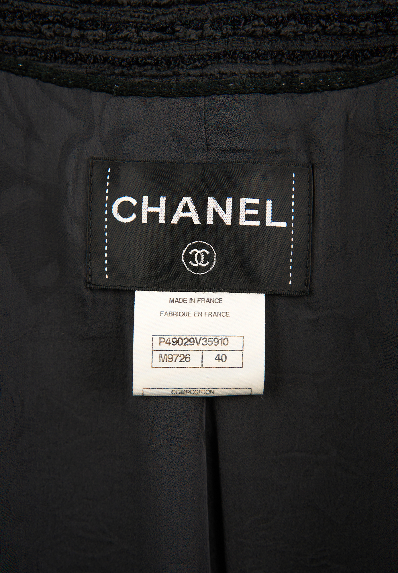 Black tweed Chanel jacket