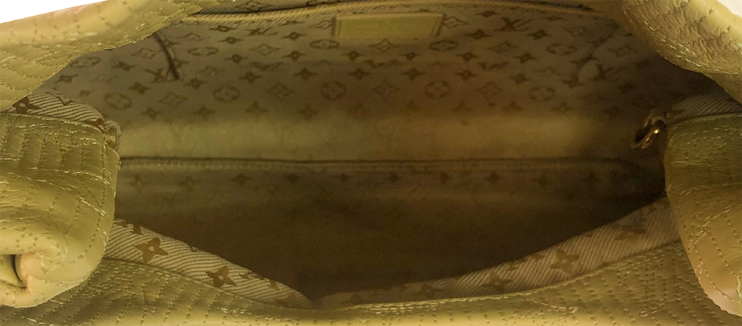 Louis Vuitton Leather Clutch