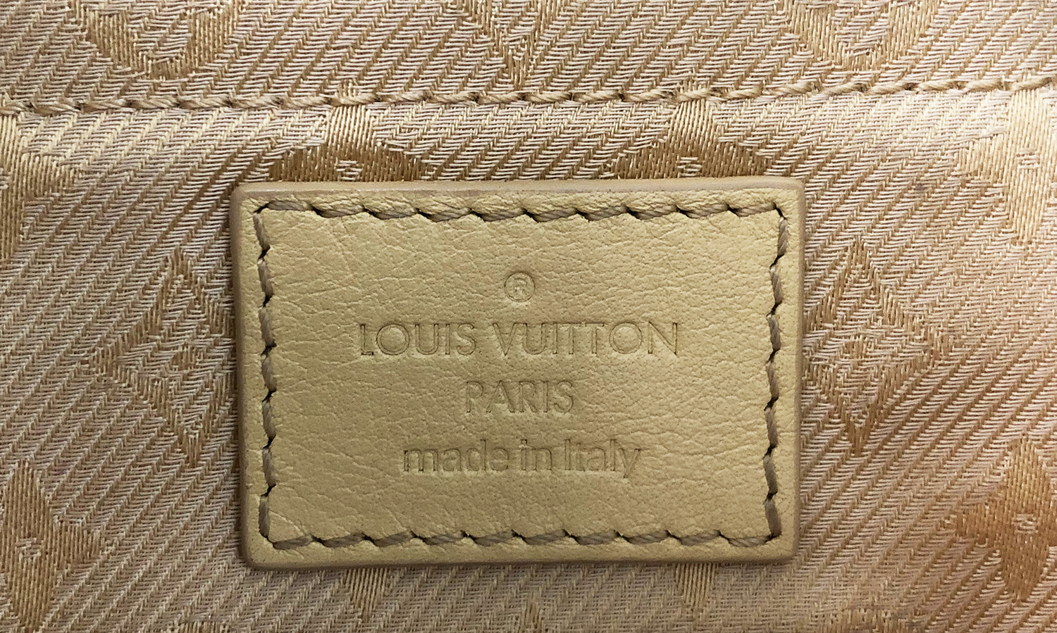 Louis Vuitton Leather Clutch
