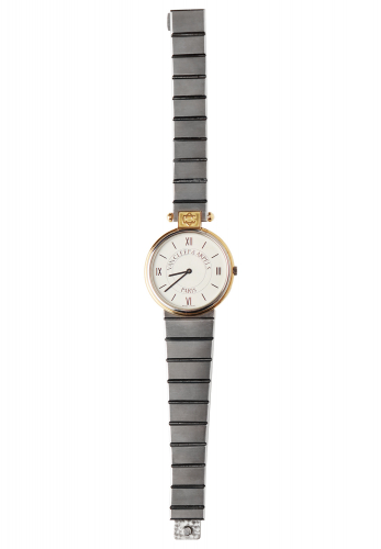 Серебристые часы Van Cleef & Arpels 