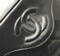 Chanel Black Tasseled Handbag On A Long Chain