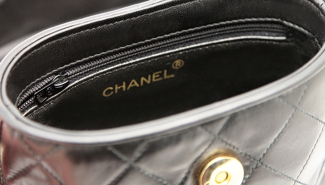 Chanel Black Tasseled Handbag On A Long Chain