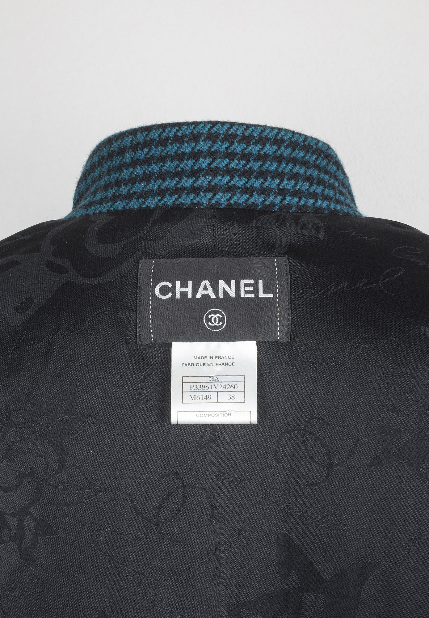 Chanel Emerald Jacket in a houndstooth pattern
