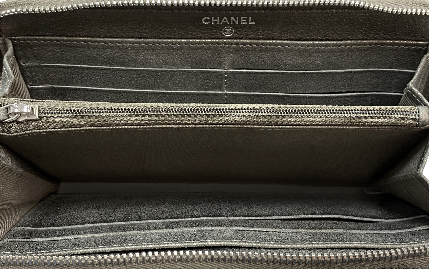 Chanel Grey Embossed Camellia Zip Wallet