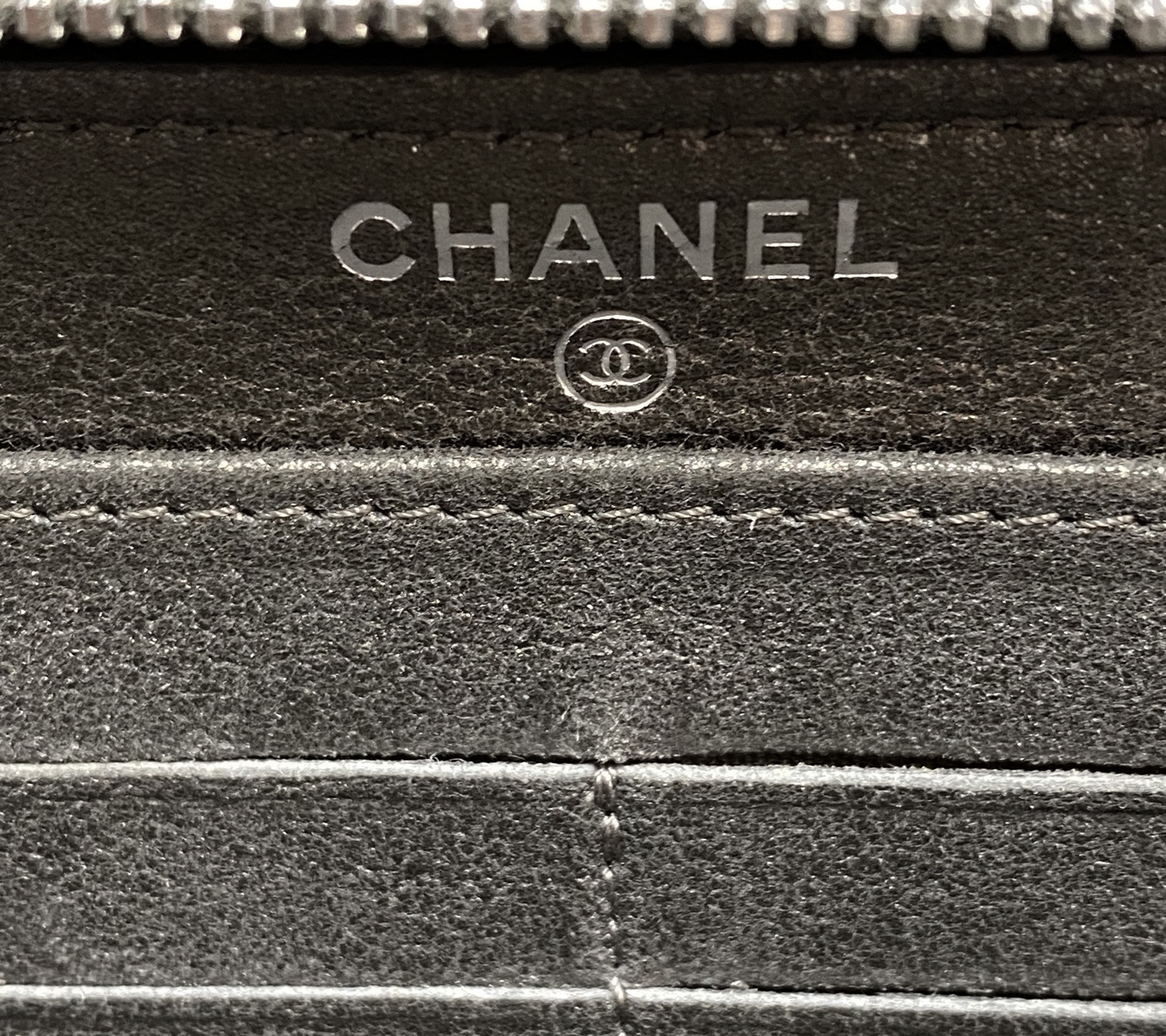 Chanel Grey Embossed Camellia Zip Wallet