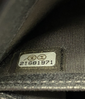 Chanel Grey Embossed Camellia Zip Wallet