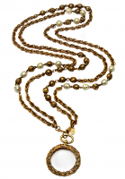 Chanel necklace with pearls and a magnifying glass pendant