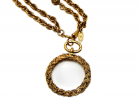 Chanel necklace with pearls and a magnifying glass pendant