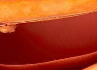 Hermès Kelly 25 Orange H Suede Bag